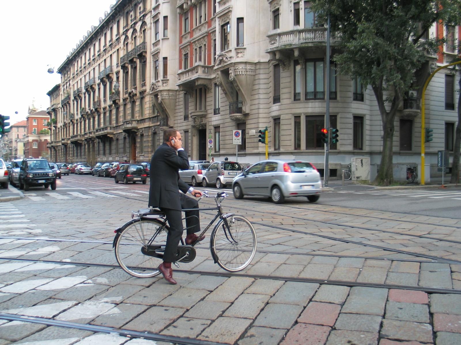 Guy on bike on cellphone