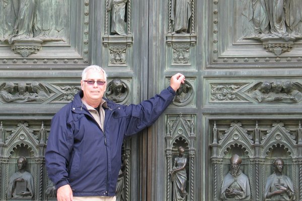 My Dad in front of the doors to the baptistry