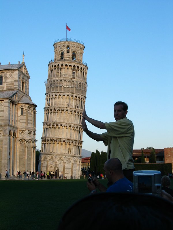 Brian tries to support the tower