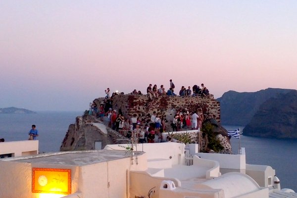 Tourists attempting to see the sunset