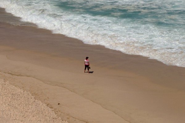 A Stranger on an empty beach