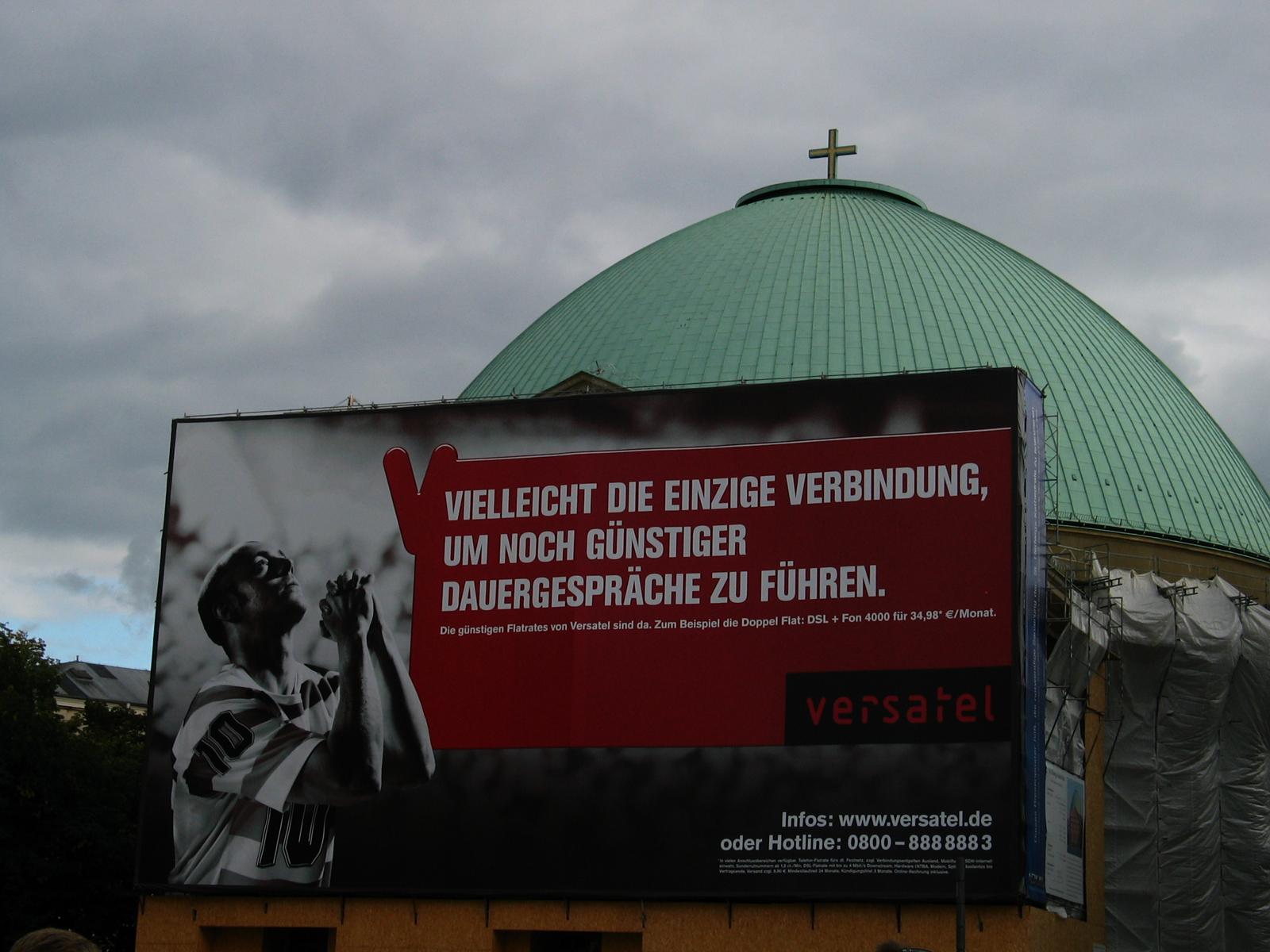 A church hidden by an ad